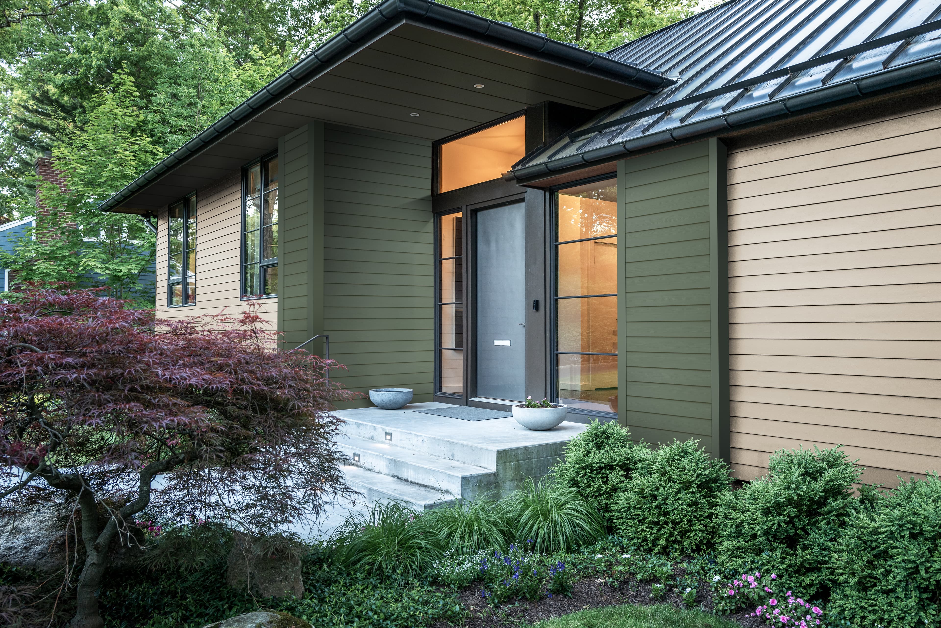 Different Styles and Colors - Home clad in Hardie® Plank Lap siding in Weathered Cliffs and a custom green Home clad in Hardie® Plank Lap siding in Weathered Cliffs and a custom green