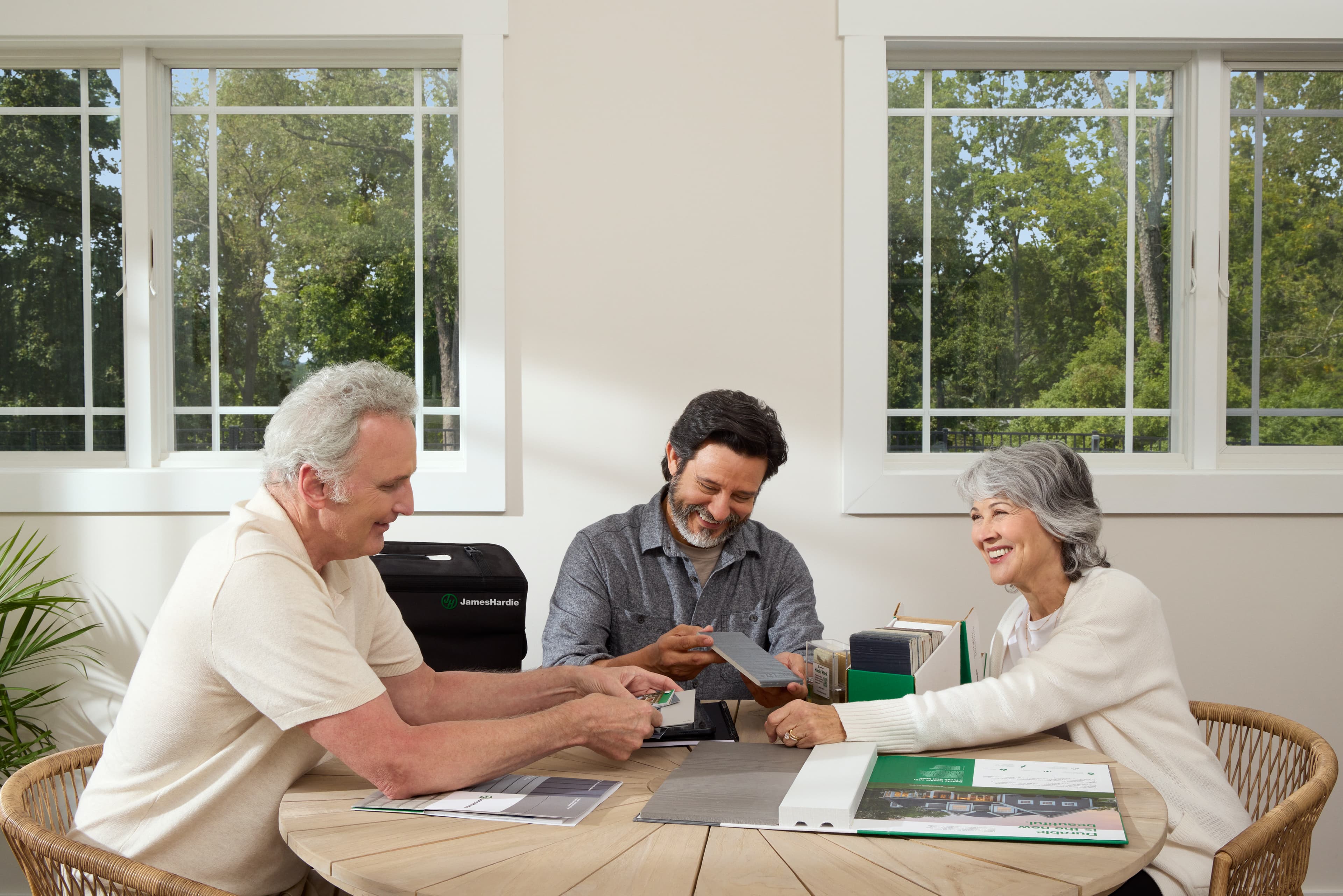 How to prepare for your first contractor meeting contractor meeting with family at kitchen table