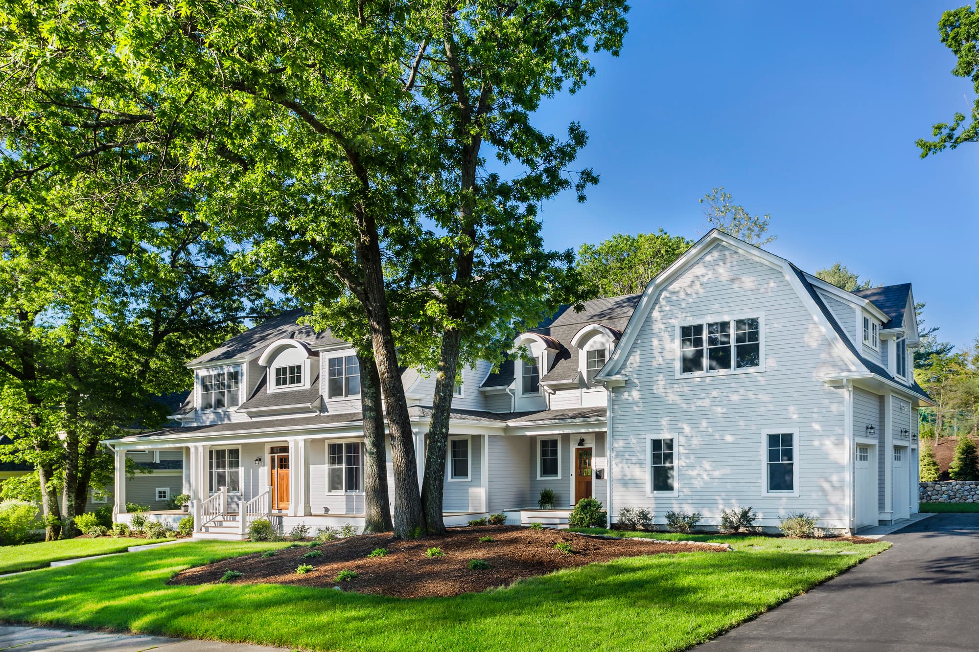 Dutch Colonial house clad in Light Mist Plank lap Hardie siding and Arctic White Hardie trim Dutch Colonial house clad in Light Mist Plank lap Hardie siding and Arctic White Hardie trim