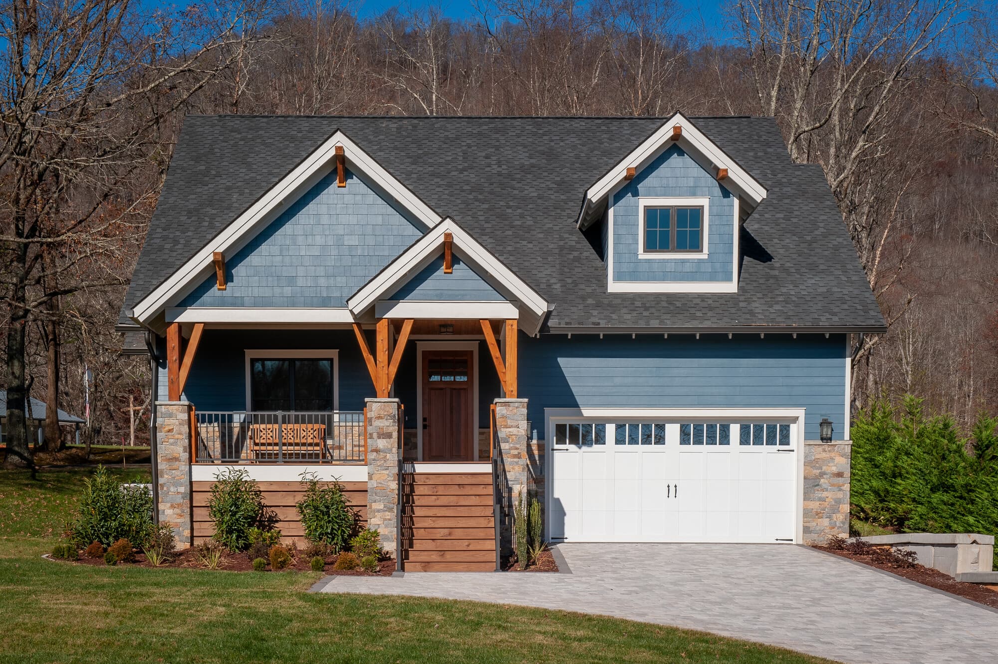 Home features Hardie Plank lap siding and Hardie Shingle siding in a custom color. Home features Hardie Plank lap siding and Hardie Shingle siding in a custom color.