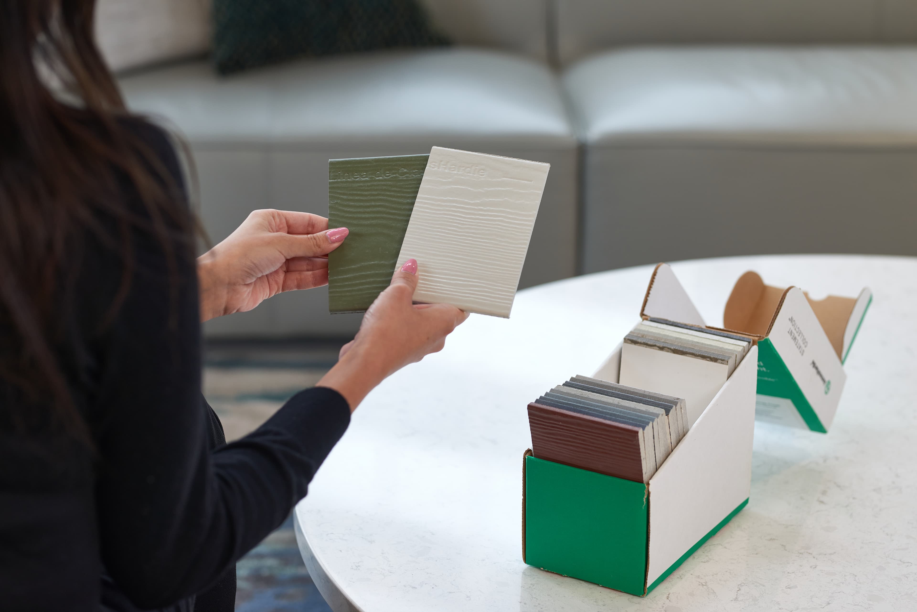 james-hardie-samples woman holding james hardie samples