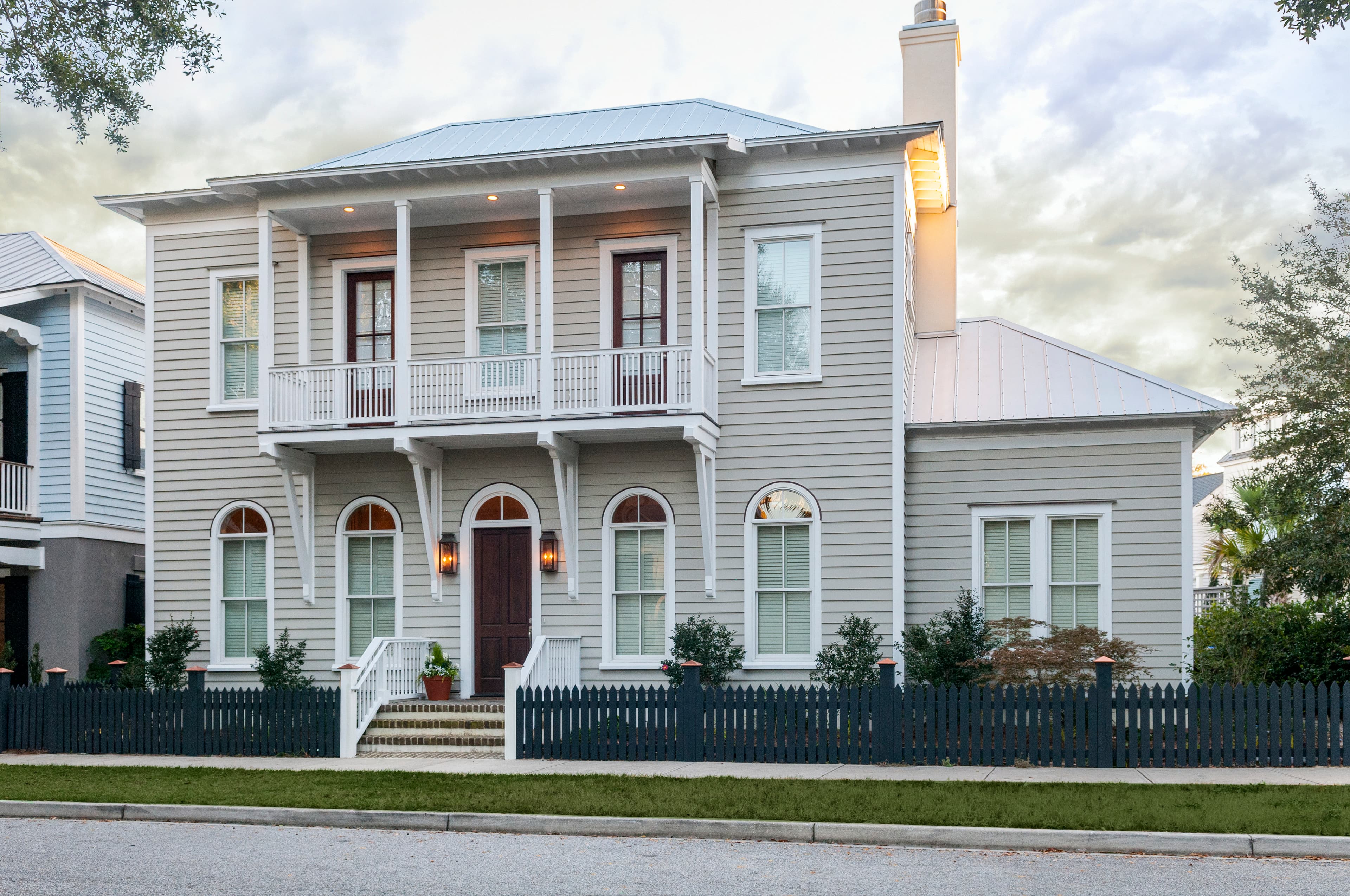 Two story house featuring Pearl Gray Artisan® Lap Plank, Shingle, Panel, Soffit, and Trim Two story house featuring Pearl Gray Artisan® Lap Plank, Shingle, Panel, Soffit, and Trim