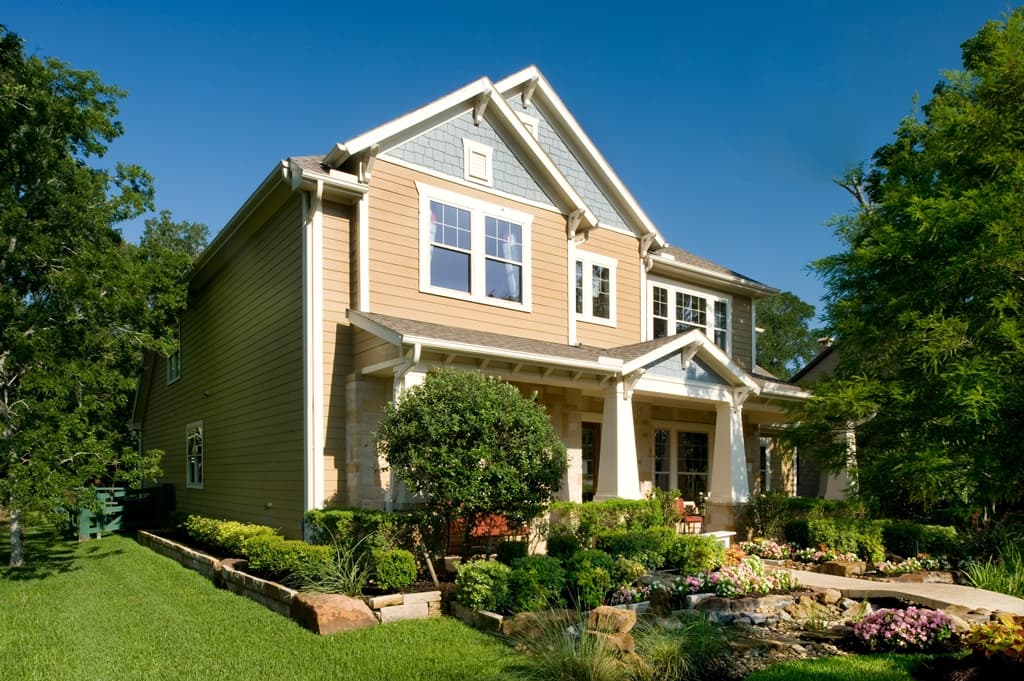 Curb Appeal 101: Two story house clad with Hardie® Plank in Fawn and Hardie® Shingle in Light Mist Two story house clad with Hardie® Plank in Fawn and Hardie® Shingle in Light Mist