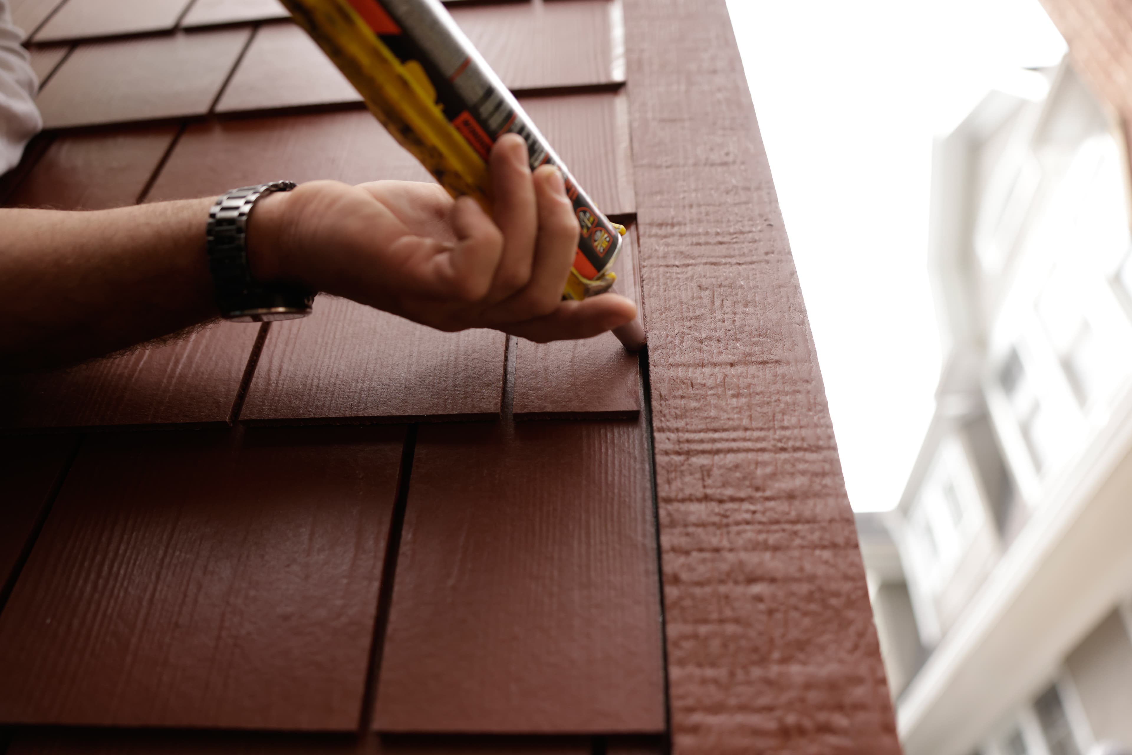 Prepare Your Home for Winter: SEAL AND PAINT EXPOSED AREAS Caulking Countrylane Red Hardie Shingle siding