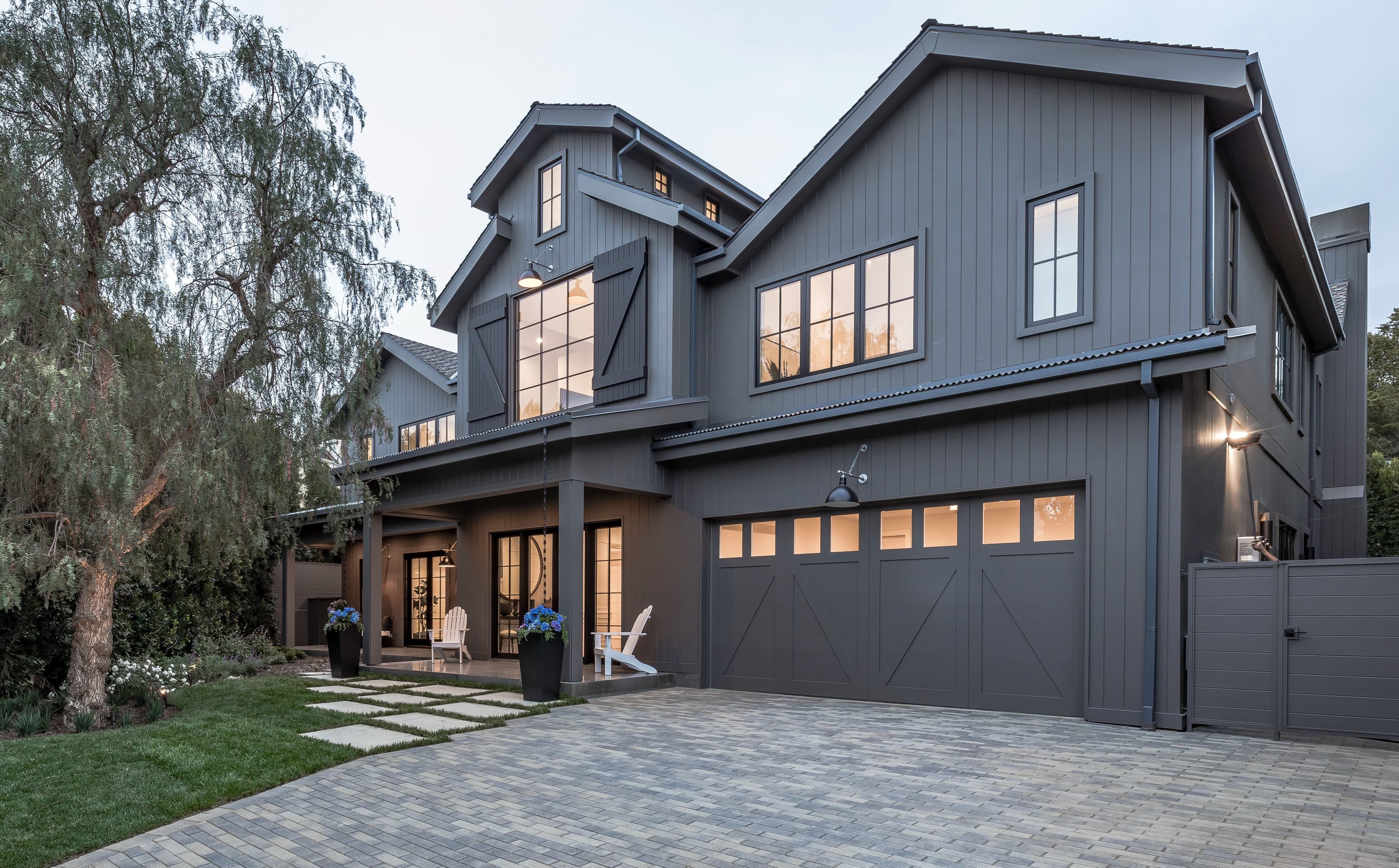 Modern farmhouse clad in vertical Hardie Artisan V-groove  Modern farmhouse clad in vertical Hardie® Artisan® V-groove