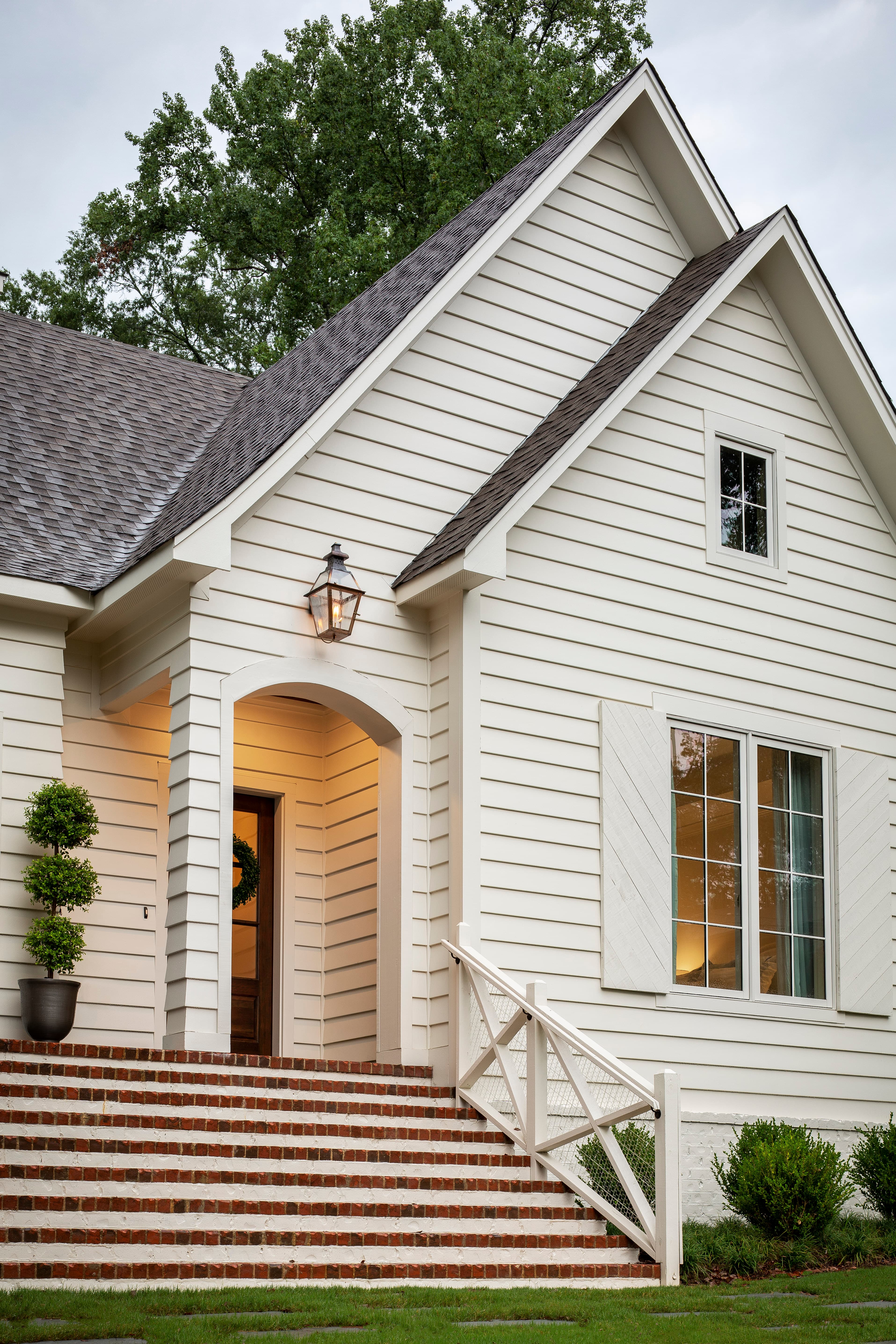 A mixed Tudor and Craftsman inspired home clad in a custom Hardie Plank Lap siding A mixed Tudor and Craftsman inspired home clad in a custom Hardie Plank Lap siding