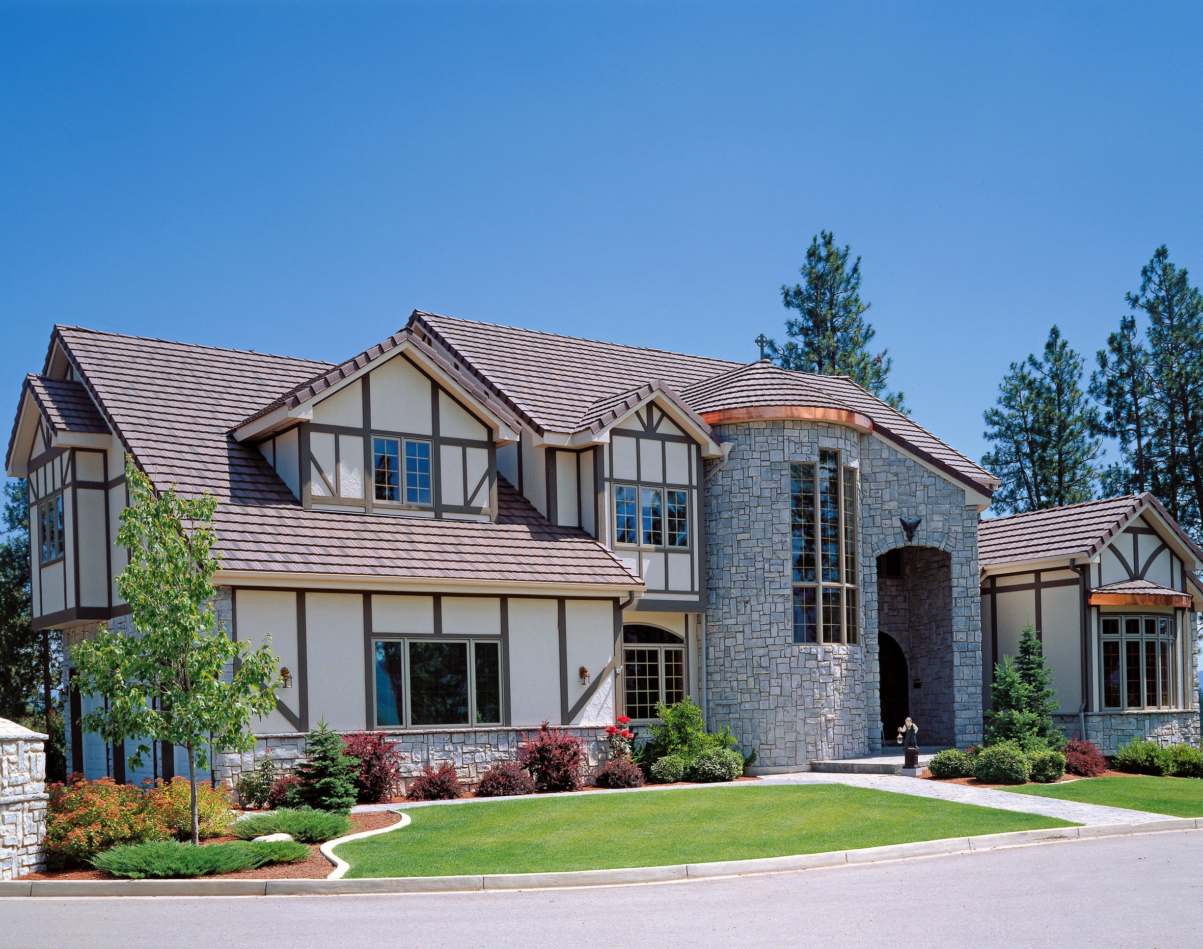 Tudor style house with Navajo Beige Hardie Panel Stucco and Timber Bark Hardie Trim Batten Boards Tudor style house with Navajo Beige Hardie Panel Stucco and Timber Bark Hardie Trim Batten Boards