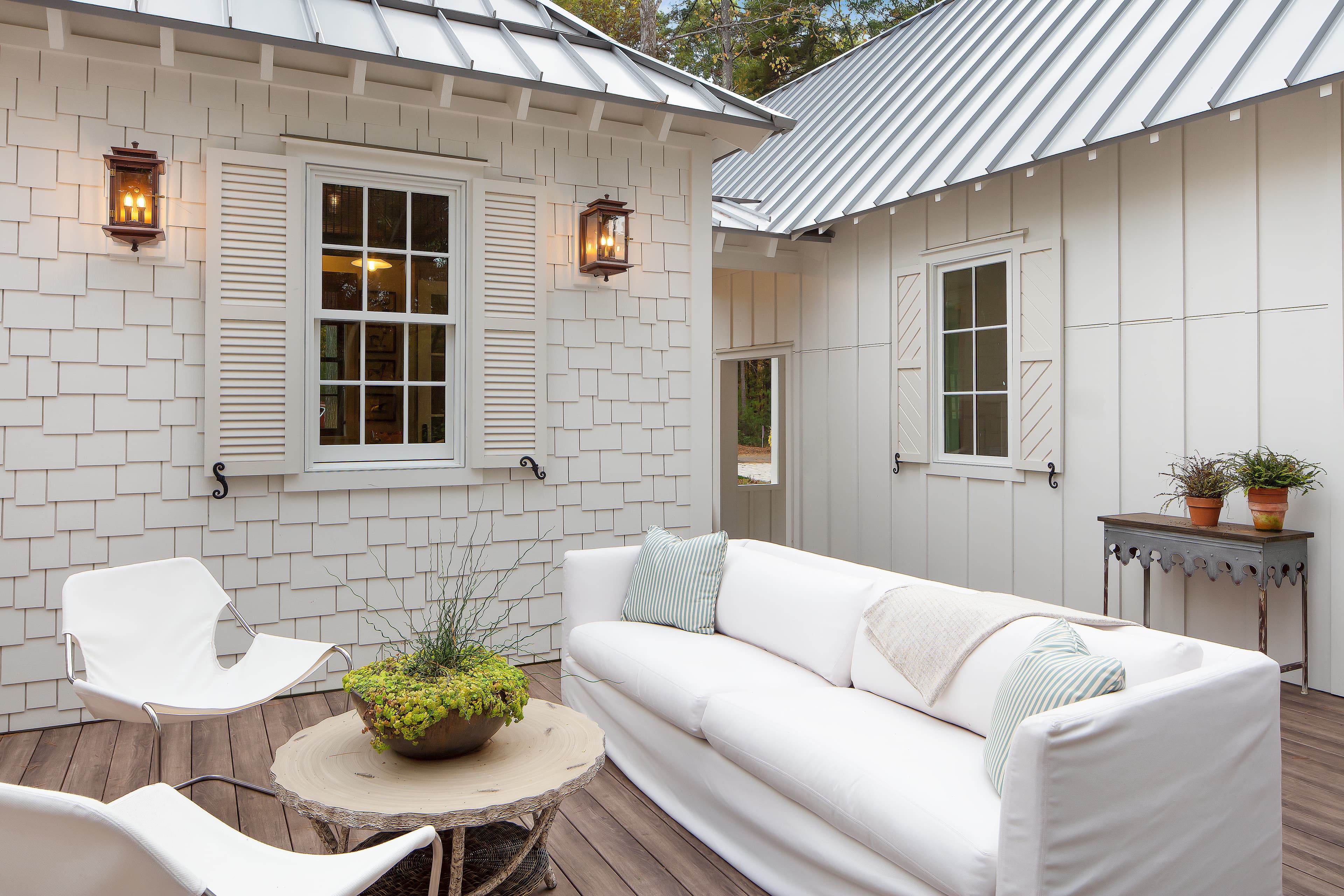 Home featuring Hardie® Artisan® Lap and Hardie® Artisan® Trim, as well as Hardie® Staggered Shingle and Hardie® Panel siding Home featuring Hardie® Artisan® Lap and Hardie® Artisan® Trim, as well as Hardie® Staggered Shingle and Hardie® Panel siding