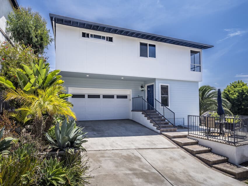 Mixing Siding Styles: Home clad with Hardie Panel and Hardie Artisan V-Groove Mixing Siding Styles: Home clad with Hardie Panel and Hardie Artisan V-Groove