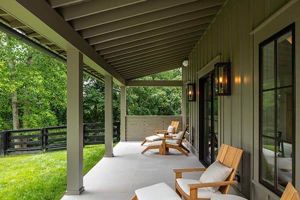 Southern Living House front porch with chairs